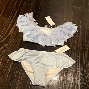 Brand new Stella Cove bathing suit for girls. 6 years old size 6/7 small.